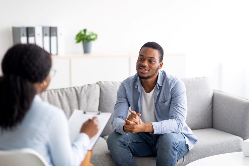 Psychiatric provider consulting patient during depression treatment session in Philadelphia